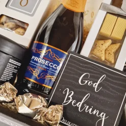 Gavekurv - ønsk 'God bedring' med Prosecco-bobler, chokolade og lakrids