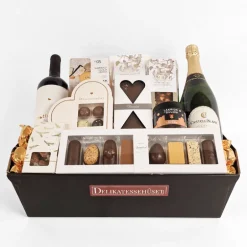 Julekurv - en elegant julegave med rødvin, nytårsbobler og chokolade