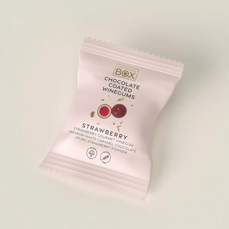 Vingummi med karamel chokolade og jordbær. Flowpack - Box the original